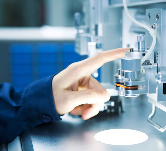 Someone operating manufacturing machinery - Lagentium Insurance Brokers