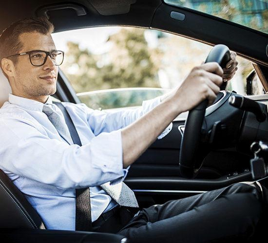 A man driving his car - Lagentium Insurance Brokers